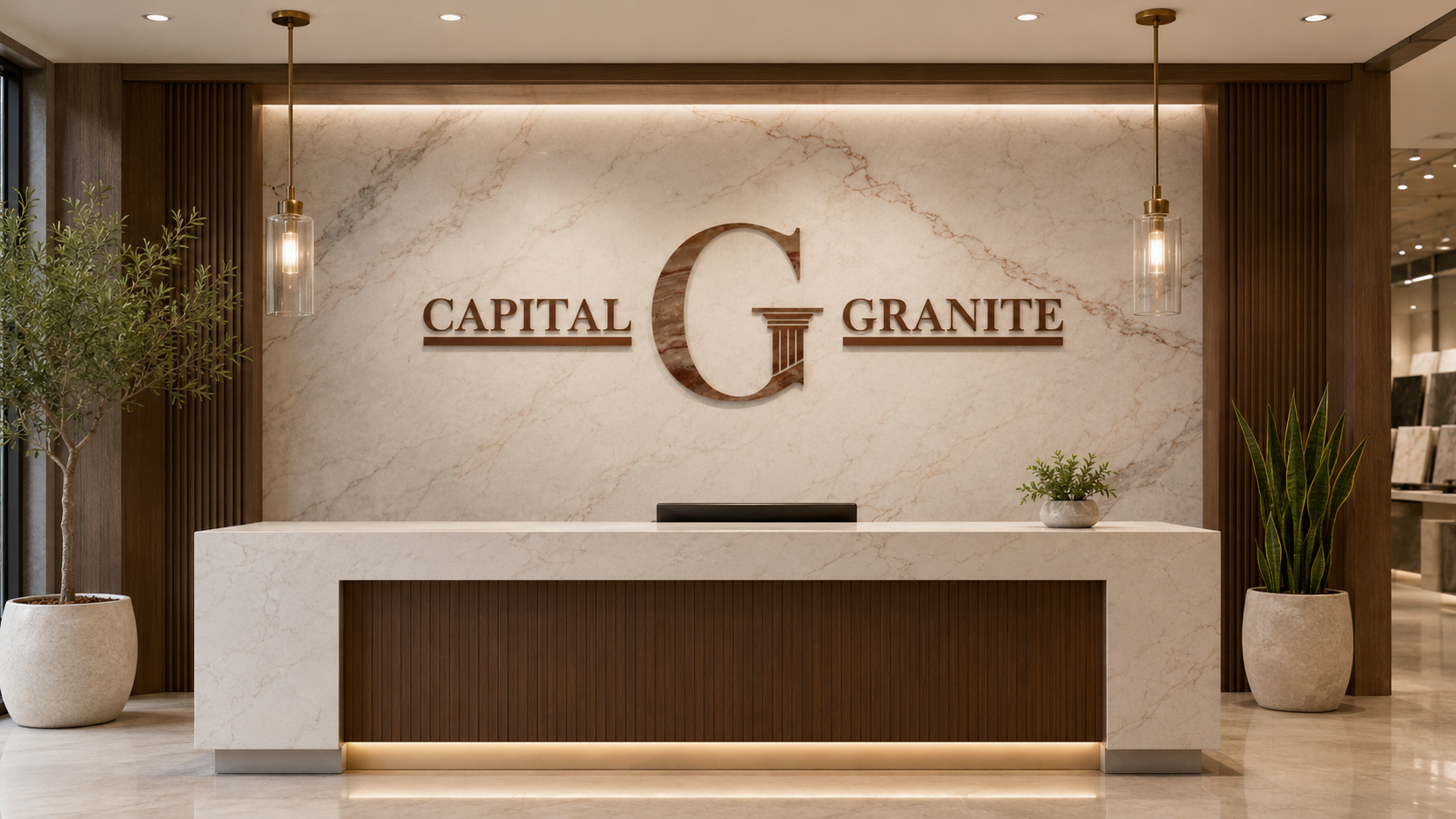 Capital Granite showroom reception with a branded quartz feature wall